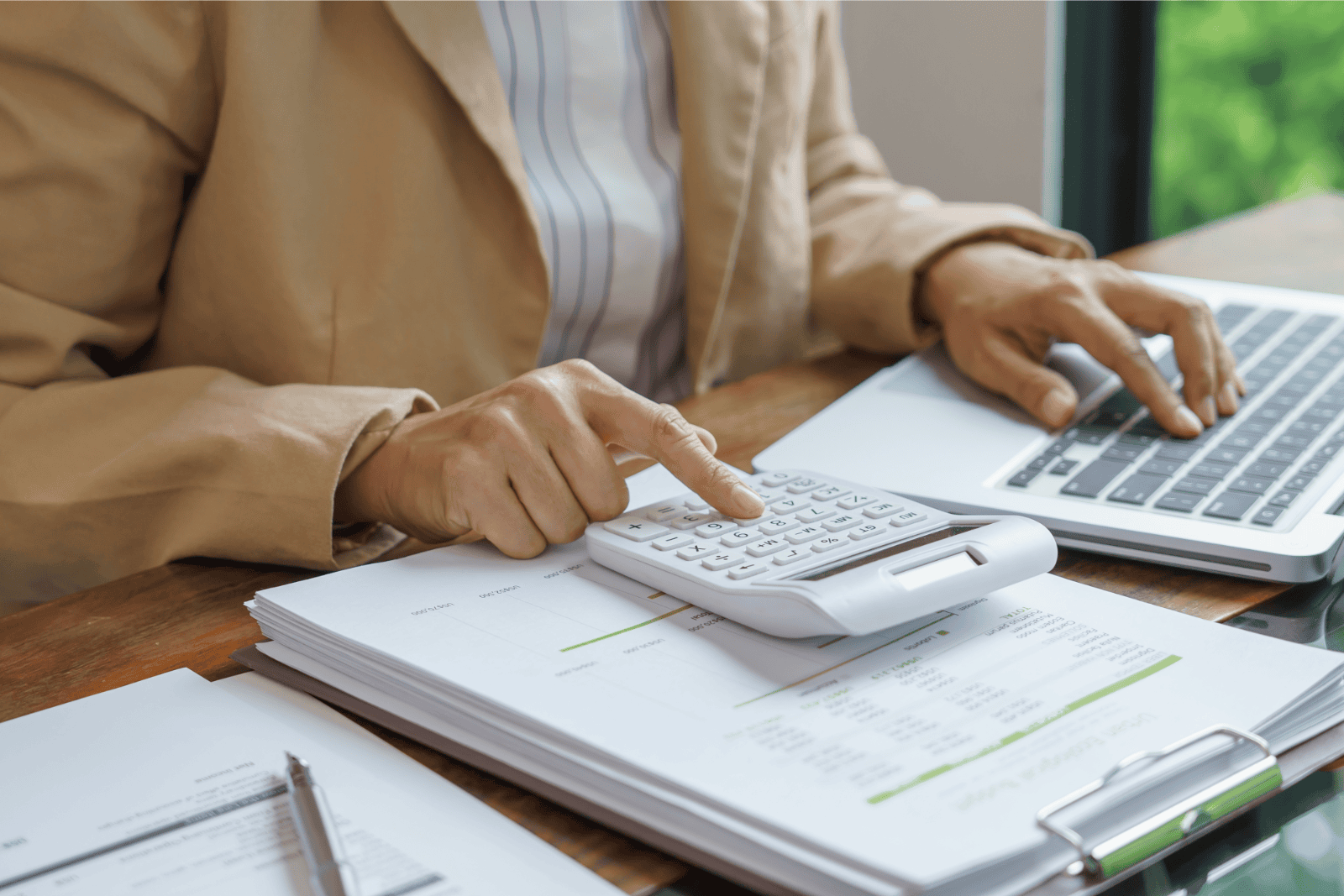 IT support for accounting firms with laptop and calculator